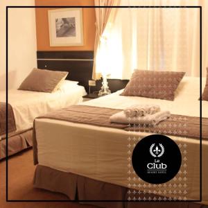Katil atau katil-katil dalam bilik di leclub resort hotel