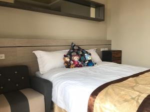 Rúm í herbergi á Good Nest Homestay