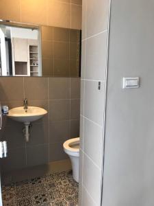 Baðherbergi á Good Nest Homestay