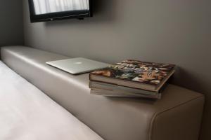 a bookcase with a pillow on top of it at Hotel Cappuccino in Seoul