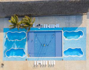 Bazén v ubytování Hotel Arena Beach Cartagena nebo v jeho okolí