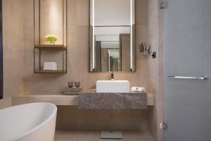 Vannituba majutusasutuses Wyndham Grand Plaza Royale Yuzhou Xiamen Wuyuan Bay