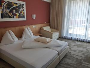 Posteľ alebo postele v izbe v ubytovaní Hotel Bokan Exclusiv
