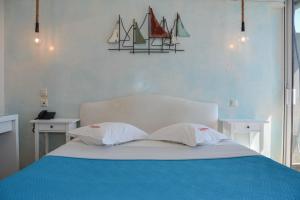 Voodi või voodid majutusasutuse Scorpios Sea Side Hotel toas