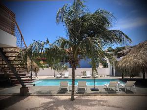 A piscina localizada em La Vista Luxury Apartment Jan Thiel ou nos arredores