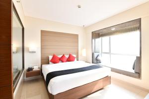 Postel nebo postele na pokoji v ubytování Krishna Palace Hotel - Ambernath