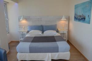 Voodi või voodid majutusasutuse Scorpios Sea Side Hotel toas