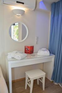 Voodi või voodid majutusasutuse Scorpios Sea Side Hotel toas
