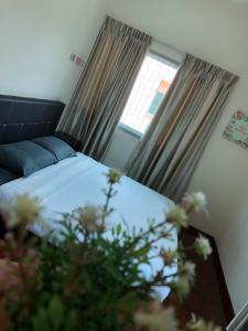 Postel nebo postele na pokoji v ubytování D’House + 7 fotografií