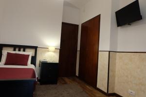 Voodi või voodid majutusasutuse Hotel Villa Nettuno toas