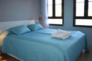 Łóżko lub łóżka w pokoju w obiekcie Marbella, Los Arqueros Golf & Country Club, Sleeps 7 plus 1 child