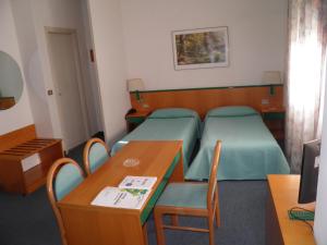 Postel nebo postele na pokoji v ubytování Hotel Ramoverde