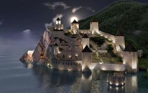 un castello su un'isola in acqua di notte di Golden Danube a Veliko Gradište