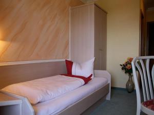 Postel nebo postele na pokoji v ubytování Gasthof-Hotel Dilger