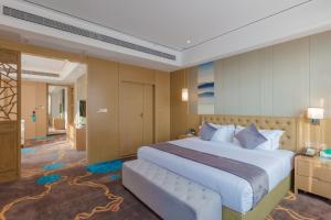 Lova arba lovos apgyvendinimo įstaigoje Taishan He Style Hotel