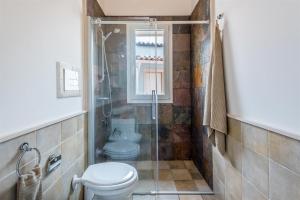 A bathroom at Dimora Villa Ada