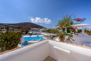 a view from the balcony of a resort with a pool at Chora Resort Hotel & Spa in Chora Folegandros