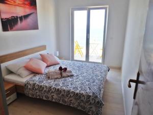Posteľ alebo postele v izbe v ubytovaní Apartment ELA enjoy breathtaking seaview