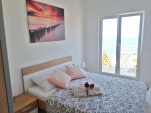 Posteľ alebo postele v izbe v ubytovaní Apartment ELA enjoy breathtaking seaview