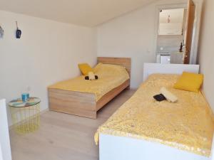 Posteľ alebo postele v izbe v ubytovaní Apartment ELA enjoy breathtaking seaview