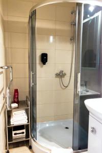 Koupelna v ubytování Karle Hotel