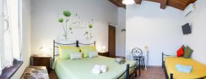 A bed or beds in a room at Il Gladiolo