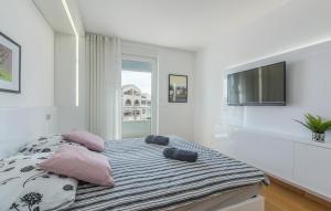 Posteľ alebo postele v izbe v ubytovaní Luxury Apartments Novigrad
