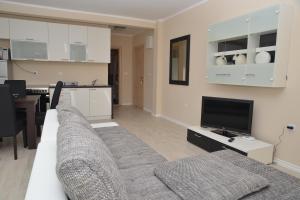 Kuchyň nebo kuchyňský kout v ubytování Apartments Mianiko