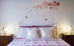 A bed or beds in a room at Il Gladiolo