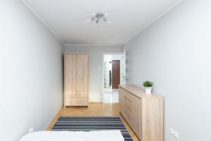 Posteľ alebo postele v izbe v ubytovaní Śliska Residence