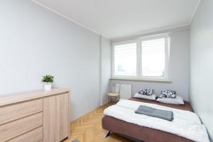 Posteľ alebo postele v izbe v ubytovaní Śliska Residence