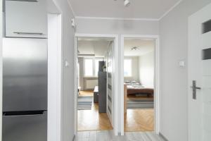 Posteľ alebo postele v izbe v ubytovaní Śliska Residence