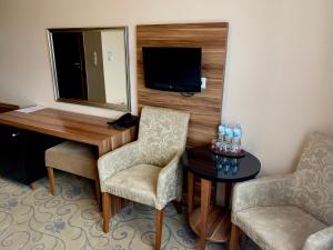 TV a/nebo společenská místnost v ubytování Hotel Komfort