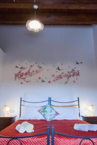 A bed or beds in a room at Il Gladiolo