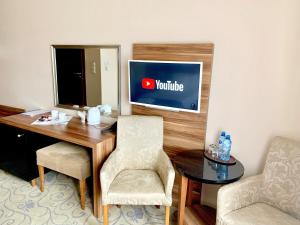 TV a/nebo společenská místnost v ubytování Hotel Komfort