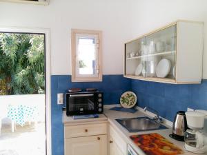 Η κουζίνα ή μικρή κουζίνα στο Bungalows Ingrid
