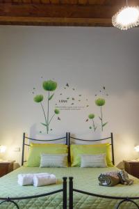 A bed or beds in a room at Il Gladiolo