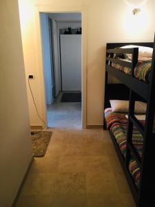 Posteľ alebo postele v izbe v ubytovaní Ledonia Apartment