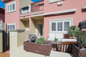 Ein Balkon oder eine Terrasse in der Unterkunft Memorable Holidays With Your Family