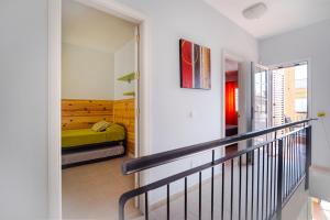 Ein Bett oder Betten in einem Zimmer der Unterkunft Memorable Holidays With Your Family