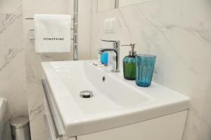 Kúpeľňa v ubytovaní Kościuszki 28 A by Homeprime