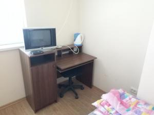 TV a/nebo společenská místnost v ubytování Hotel Uyut