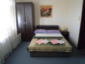 Postel nebo postele na pokoji v ubytování Hotel Le Village