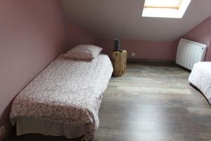 Postel nebo postele na pokoji v ubytování Domaine de Praline Praline