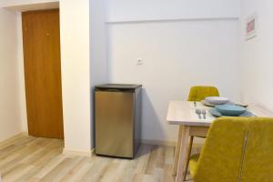 Posezení v ubytování La Perla Apartments