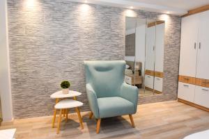 Posezení v ubytování La Perla Apartments