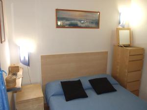 A bed or beds in a room at Le Case del Sole