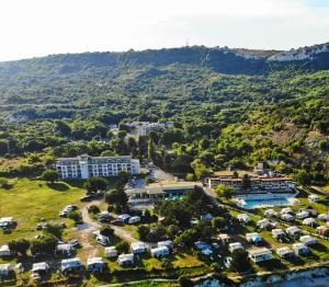 an aerial view of a resort with a parking lot at Saint George Hotel 1 in Balchik