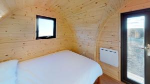 Camping Pods, Seaview Holiday Park客房内的一张或多张床位