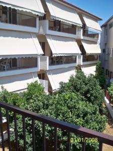 a view of a building from the balcony at Theoxenia Paralio Astros in Paralio Astros